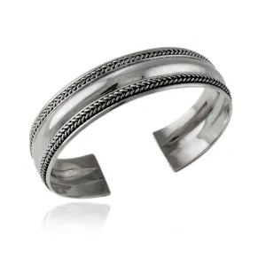 Elegancka szeroka oksydowana srebrna bransoleta ze wzorem warkocz srebro 925